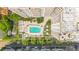 An aerial view showcases the pool, cabanas, and surrounding residential buildings at 100 S Eola Dr # 1102, Orlando, FL 32801