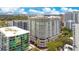 Aerial view of the condominium showcasing its architectural design and its prime location in a vibrant neighborhood at 100 S Eola Dr # 1102, Orlando, FL 32801