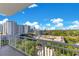 This gorgeous balcony view showcases the lush scenery and stunning city skyline at 100 S Eola Dr # 1102, Orlando, FL 32801