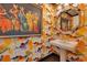 Chic powder room with striking wallpaper, pedestal sink, and decorative mirror enhancing its sophisticated charm at 100 S Eola Dr # 1102, Orlando, FL 32801