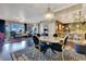 Open-concept dining area with a chandelier, seamlessly connects to the living room and gourmet kitchen at 100 S Eola Dr # 1102, Orlando, FL 32801