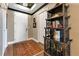 Welcoming entryway with decorative cabinet, accent rug, and natural light from above at 100 S Eola Dr # 1102, Orlando, FL 32801