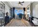 This home office features a modern aesthetic, neutral tones, and plenty of natural light at 100 S Eola Dr # 1102, Orlando, FL 32801