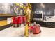 Modern kitchen decorations include red flower decor with stainless steel oven in the background at 100 S Eola Dr # 1102, Orlando, FL 32801