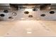 Close up of the white countertop and flat top stove in the modern kitchen at 100 S Eola Dr # 1102, Orlando, FL 32801