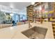 Island featuring a stainless steel sink with modern fixtures and barstool seating at 100 S Eola Dr # 1102, Orlando, FL 32801