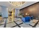 Elegant condo lobby with a grand chandelier, comfortable seating, and sophisticated decor at 100 S Eola Dr # 1102, Orlando, FL 32801