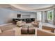 Relaxing resident lounge features seating, bar area, and ample space for gatherings at 100 S Eola Dr # 1102, Orlando, FL 32801