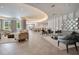 Inviting lounge area with plush seating, stylish decor, and ample natural light at 100 S Eola Dr # 1102, Orlando, FL 32801