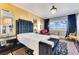Elegant main bedroom featuring a statement headboard, plush bedding, and sophisticated design elements at 100 S Eola Dr # 1102, Orlando, FL 32801