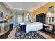This main bedroom is complete with artistic touches, unique furnishings, and a gorgeous area rug at 100 S Eola Dr # 1102, Orlando, FL 32801
