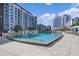 Enjoy a refreshing dip in this community pool, featuring elegant lounge seating and nearby cabanas at 100 S Eola Dr # 1102, Orlando, FL 32801