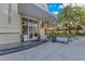 Restaurant entrance with a covered outdoor seating area and accessible entry steps at 100 S Eola Dr # 1102, Orlando, FL 32801