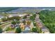 An aerial view showing a pool in a single Gathering home's backyard in a neatly planned residential neighborhood at 11209 Taeda Dr, Orlando, FL 32832
