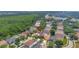 Here is an aerial view of a single-Gathering home in a well-maintained neighborhood with lush surroundings at 11209 Taeda Dr, Orlando, FL 32832