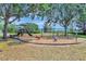 Community playground offering a variety of colorful and engaging play equipment for of all ages at 11209 Taeda Dr, Orlando, FL 32832