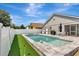 Inviting pool and backyard with a splash, perfect for cooling off and enjoying outdoor activities at 11209 Taeda Dr, Orlando, FL 32832