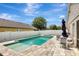 Beautiful backyard featuring a sparkling pool and patio area, ideal for entertaining and enjoying the outdoors at 11209 Taeda Dr, Orlando, FL 32832
