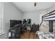 Comfortable bedroom with a bunk bed and a dedicated study area at 116 Hurst Ct, Deland, FL 32724