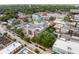 Aerial shot of government buildings, featuring classic architecture, a dome, parking areas, and lush green surroundings at 116 Hurst Ct, Deland, FL 32724