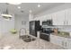 Modern kitchen featuring granite countertops and stainless steel appliances at 116 Hurst Ct, Deland, FL 32724