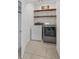 Well-organized laundry room with modern washer and dryer units at 116 Hurst Ct, Deland, FL 32724