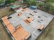 Aerial view of a skate park featuring an array of ramps, rails, and obstacles for skateboarders at 116 Hurst Ct, Deland, FL 32724