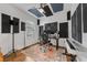 Music studio with soundproofing panels, musical instruments and large monitors at 116 Hurst Ct, Deland, FL 32724
