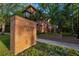 Stetson University sign with a well-maintained garden, brick buildings, and mature trees in the background at 116 Hurst Ct, Deland, FL 32724