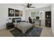 Inviting bedroom with a comfortable bed, modern decor, and ample natural light at 1209 Stevens Ave, Orlando, FL 32806