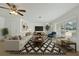 Bright living room with a large window, stylish furnishings, and modern decor at 1209 Stevens Ave, Orlando, FL 32806