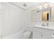 Bathroom with a white shower curtain, and white cabinets at 121 Teriwood St, Fern Park, FL 32730