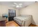 Bedroom featuring ceiling fan, a dark curtain and a soft daybed at 121 Teriwood St, Fern Park, FL 32730