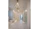 Modern bathroom features an open design with marble tile, soaking tub and glass shower at 1220 Delaney Park Dr, Orlando, FL 32806