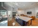 Gourmet kitchen featuring island, stainless appliances and hardwood floors throughout at 1220 Delaney Park Dr, Orlando, FL 32806