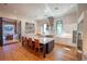 Spacious kitchen with center island and breakfast bar adjacent to a dining area at 1220 Delaney Park Dr, Orlando, FL 32806