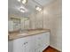 Bathroom features a double sink vanity, large mirror, and modern lighting at 1329 Maury Rd, Orlando, FL 32804