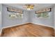 Bedroom featuring hardwood floors, natural light, and window treatments at 1329 Maury Rd, Orlando, FL 32804