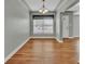 Open dining area showcases wood floors and ample natural light at 1329 Maury Rd, Orlando, FL 32804