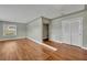Bright living room showcasing hardwood floors, neutral walls, and large window for natural light at 1329 Maury Rd, Orlando, FL 32804