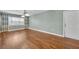 Living area with neutral colors, wood floors and natural light at 1329 Maury Rd, Orlando, FL 32804