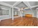 Spacious living room with hardwood floors, columns, and decorative beams at 1329 Maury Rd, Orlando, FL 32804