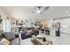 Open-concept living space seamlessly integrates the kitchen, dining area, and living room at 1423 Marsh Meadow Ln, Davenport, FL 33896