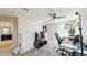 Upstairs loft with workspace and view of en-suite bathroom at 1423 Marsh Meadow Ln, Davenport, FL 33896