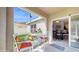 Outdoor patio with table and chairs, leading to dining room and yard at 1423 Marsh Meadow Ln, Davenport, FL 33896