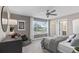 This bedroom has a large window providing natural light, closet and adjoining bathroom at 15319 Soaring Bluff Dr, Montverde, FL 34756
