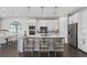Modern kitchen featuring a center island, pendant lighting, and stainless steel appliances at 15319 Soaring Bluff Dr, Montverde, FL 34756