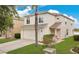 Charming two-story home with a well-manicured lawn and attached two-car garage at 1556 Sherbourne St, Winter Garden, FL 34787