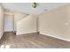 Bright living room with new floors, staircase, and fresh paint at 1556 Sherbourne St, Winter Garden, FL 34787