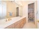 Bright bathroom with a double vanity and separate room for the toilet and shower at 1709 Iverness Ct, Longwood, FL 32779